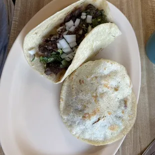 Barbacoa taco and Gordita