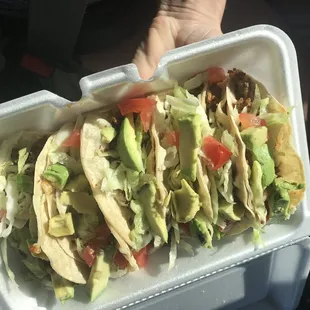 Tacos with chorizo, beans, cheese, lettuce, tomato, and avocado---delish!!