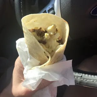 Chorizo, egg, bean, and cheese breakfast burrito. This is my new favorite thing here!!