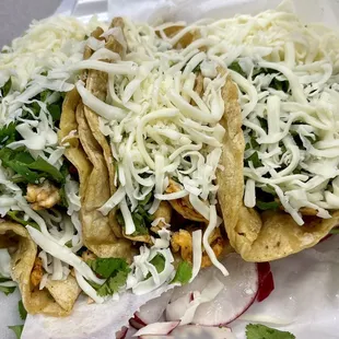 3 chicken tacos, no onion, add cheese.