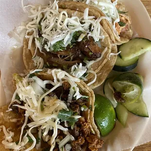 Campechano (Steak - Chorizo) Taco in front, then carnitas, then chicken in the back. Loved all three