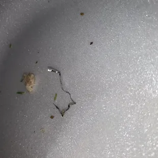 a piece of food left in a bowl