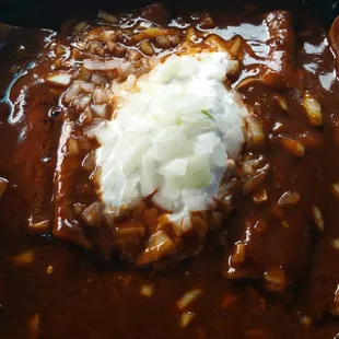 Enchiladas poblanas. That red mole sauce is to die for!