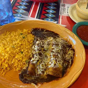 enchiladas Mole with rice and queso and salsa