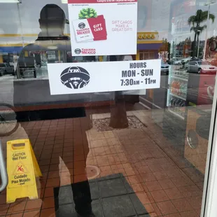 a sign in the window of a restaurant