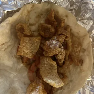 a tortilla filled with meat