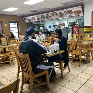 two people sitting at a table