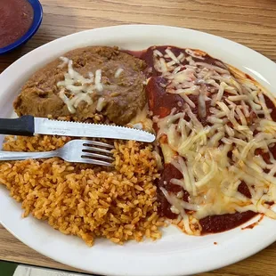 Lunch enchilada plate with rice and beans