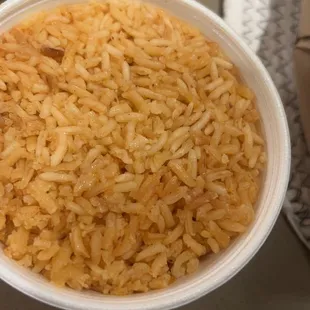 Hard over cooked rice look at those dark grains. I wish picture can do justice on how overcooked this rice was
