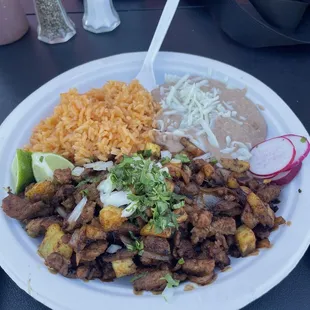 Pastor plate. Comes with rice, beans, and corn tortillas