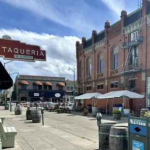 Street blocked off with outdoor seating.