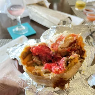 Crazy burrito with Cheetos, fries and carne asada