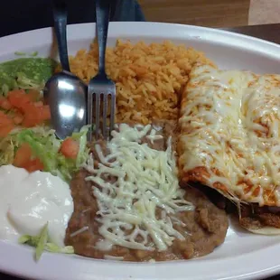 Pork enchilada combination dinner