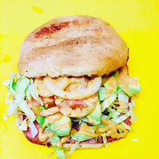 a sandwich on a yellow background