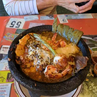 Behold the mighty molcajete, undisputed ruler of the Michoacan menu.