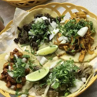 two tacoss on a table