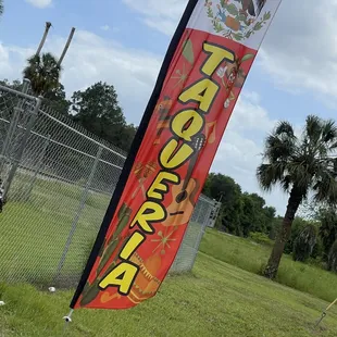 It has a few flags out front.