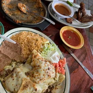 Beef enchiladas with green sauce. Chicharrones. Queso fundido.