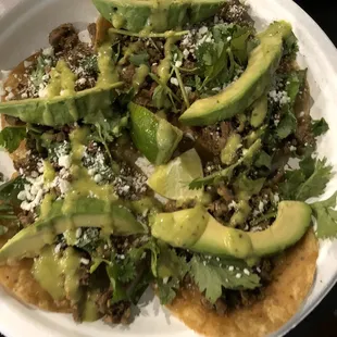 Five street tacos add avocado and cheese