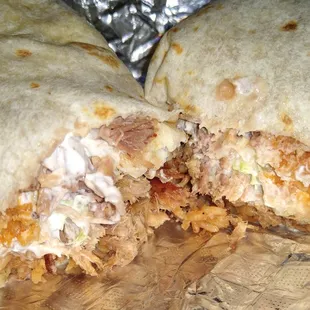 Carnitas burrito -- meat extra crispy &amp; oily, the rest rice. 3/5