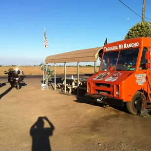 an orange food truck
