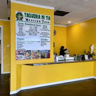 a woman standing at a counter
