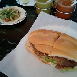 Carne asada torta with a carnitas taco.