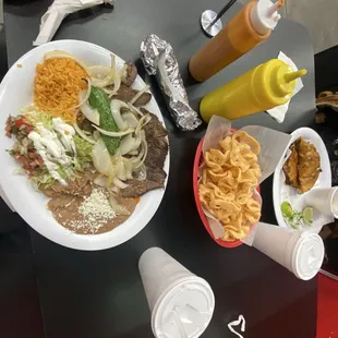 Carne Asada, Chicharrones de harina, and Lengua birria tacos