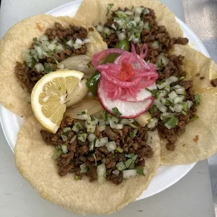 a taco with a slice of lemon