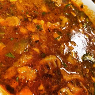 Authentic Menudo.. with the cow knuckles and beef tripe with no hominy.