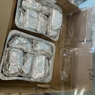 Asada and pollo burritos. These were essentially half burritos. Perfect size per person.