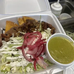 Tacos dorados de papa con carnitas