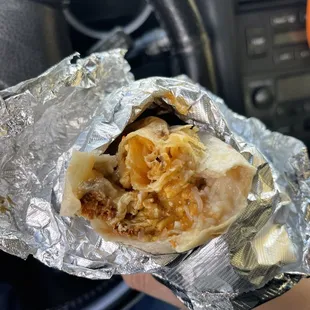 Breakfast Burrito - chorizo, eggs, cheese, refried beans and salsa $9.66 with tax