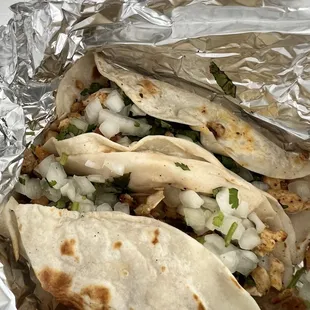 Chicken on flour tacos