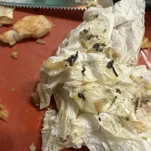 All of the black on the napkin is the poop-filled digestive tracts I pulled out of the fully-veined shrimp in my burrito