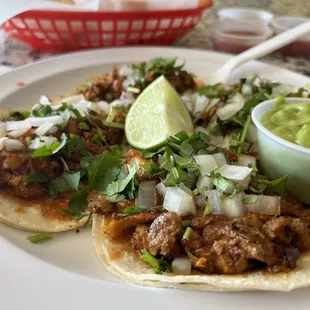 Al pastor tacos and side of guacamole
