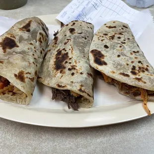 Chicken, pork and a pork with red sauce