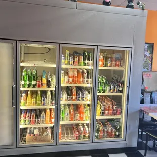 a refrigerated display of beverages