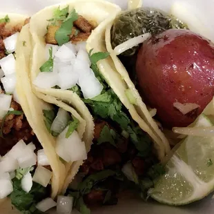 Pastor &amp; chorizo tacos on corn tortillas.