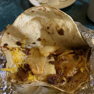Cheese , potato, bacon taco.