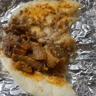 Spicy chicharron breakfast taco. Hubby said it was very tasty &amp; very spicy.