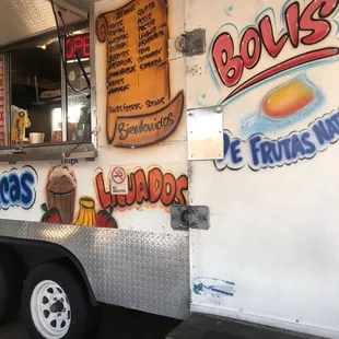 a food truck parked in a parking lot