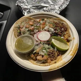 Al pastor, carnitas, and chorizo tacos