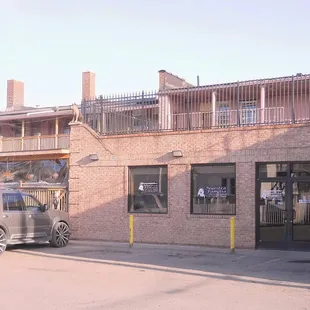 entrance from parking lot, showing seasonal patio area off to the side