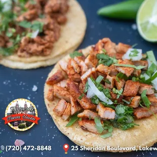 two tacos on a table