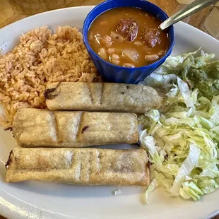 Chicken Flautas with rice &amp; charro beans.