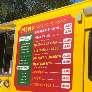 a menu on a food truck