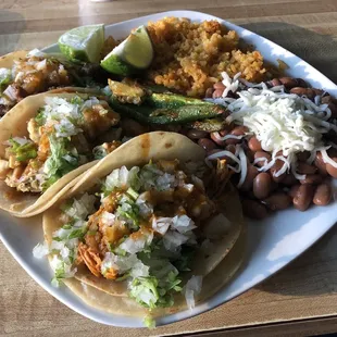 The beef and chicken tacos. Some pork taco is in the back. Rice and beans are there too of course.