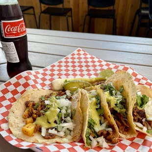 4x al pastor tacos con todo and a coke with tip around $11 special