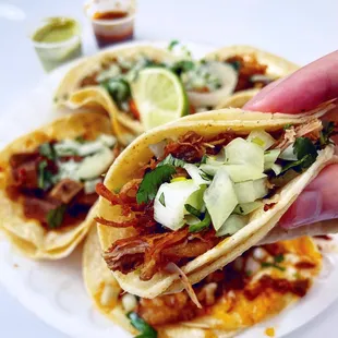 Carnitas, lengua, cabeza, and tripa tacos  IG: @fooddeclassified